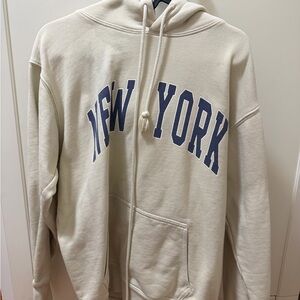 Brandy Melville John Galt New York Beige Hoodie